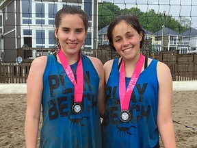 Ryann Turner, left, and Elliot Cowan won silver medals in the 14-and-under girls' premier division at an Ontario Volleyball Association beach volleyball tournament in Port Stanley, Ont., on Sunday, June 3, 2018. (Contributed Photo)
