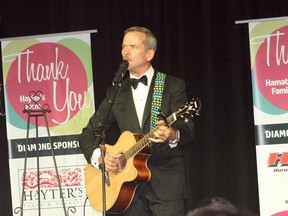 Retired Canadian astronaut Chris Hadfield performs his version of David Bowie’s Space Oddity June 1 at the ninth annual South Huron Hospital Foundation Gala. Hadfield spoke of his adventures in space, participated in the silent auction and stayed afterwards for photos and autographs. (Scott Nixon/Exeter Lakeshore Times-Advance)