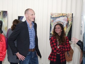 Dean Armstrong was surrounded by friends, family and students at his exhibit opening on June 1 at the Sherven-Smith Art Gallery. The works are on display for the month of June.