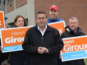Nipissing NDP candidate Henri Giroux gathers with supporters outside Widdifield Secondary School, Tuesday.
Christian Paas-Lang / The Nugget