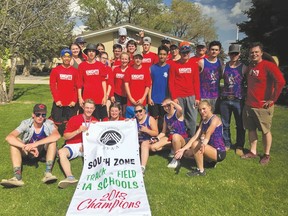 The J.T. Foster senior varsity track and field team poses with the 1A south zone banner. J.T. Foster photo via Twitter