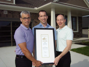 St. Thomas-based Hayhoe Homes’ Tom Looby, left, Joe Hayhoe and Will Hayhoe won a 2018 Homeowners' Choice Award