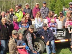 More than 40 Bruce Peninsula Sportsmen's Association members, aged 2-82, gathered to stock 11,000 yearling rainbow trout in Gleason Brook off Grey Road 1 in Owen Sound on the Victoria Day long weekend. Photo by Stu Paterson