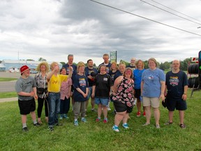 Participants in last year's Torch Run gathered on the lawn of McGee Motors in Goderich. This year's event is on Tuesday, June 12 at 8am from the Goderich OPP detachment.  (Kathleen Smith/Goderich Signal Star)