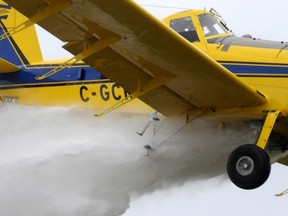 Travis Karle demonstrates how his crop dusting plane can be re-tasked to help local fire departments.