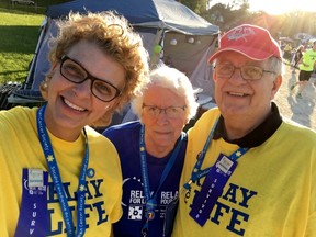 Christine Nobles, left, accompanied by her parents Gloria and Fred, was one of the cancer survivors who spoke during the opening ceremonies for this year’s Relay for Life in Stratford. Handout/Stratford Beacon Herald/Postmedia Network