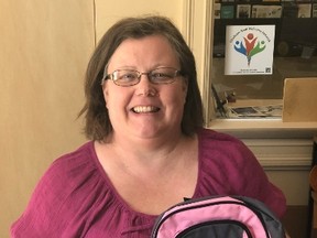 Shown is Mary Symons, Good Neighbours co-ordinator, United Way of Chatham-Kent. Operation BackPacks is now underway in the community, providing school supplies to those in need. (Handout)