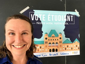 Katherine Graham Burra, a history and civics teacher at Kingston Collegiate and Vocational Institute, organized the students participation in Student Vote mock election. The students cast their votes in the provincial election this week. Nick Pearce/The Whig-Standard