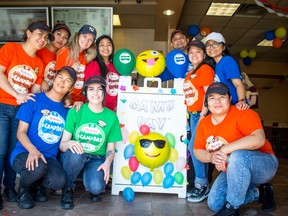 Stonewall's Tim Horton's crew celebrating Camp Day, where all proceeds from coffees sold by restaurant owners will go towards sending underprivileged children to camps. Pictured clockwise from left: Adona Quejano, Norma Lerma, Ainsley Pilgrim, Patricia Oller, Marcelino Casabal,
Realyn Baxa, Alyssa Patolot, Jennica Olalia, Leann Langelier, Edmil Rialubin