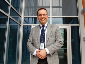 Luke Hendry/The Intelligencer
Dr. Piotr Oglaza stands outside the headquarters of Hastings Prince Edward Public Health Wednesday in Belleville. A Polish-born resident of the Kingston area, he'll become medical officer of health for Hastings and Prince Edward Counties on July 1.