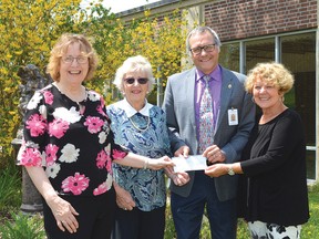 Photo by KEVIN McSHEFFREY/THE STANDARD
Geraldine Robinson - St. Joseph’s General Hospital Auxiliary president, Faye Steel - auxiliary treasurer and Brenda Farquhar - auxiliary gift shop convener, present the organization’s cheque for $32,326 to hospital CEO Pierre Ozolins.