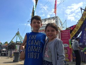 Nathan and Lyla Fitzgerald were at the St. Anne’s Community Festival midway on Wednesday afternoon. The 47th annual festival takes place over four days and benefits local charities. (Laura Broadley/Times-Journal)