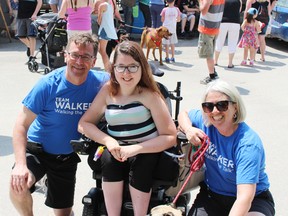 Natalie McDonald of Hanover with Bruce-Grey-Owen Sound MPP Bill Walker and his wife Michaela and dog Poppy. (Don Crosby/Special to Postmedia)