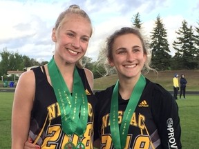 (L to R) Brenna McRae and Kira Comfort show off the medals they captured at SHSAA Track and Field Provincials in Prince Albert on Saturday, June 2.