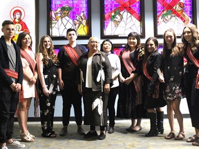 A group of Indigenous and Metis students from Archbishop Jordan participated in the school's first ever Indigenous graduation blessing on Friday, June 1. The event featured a presentation of Metis sashes, as well as a feather ceremony led by Elder Theresa Strawberry.

Zach Mueller/News Staff