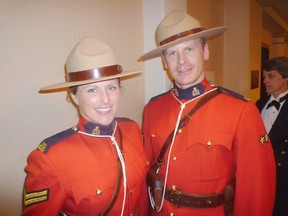 Stony Plain/Enoch/Spruce Grove Detachment Commander, Mike Lokken (right), alongside Cpl. Lara Bristow in 2012.