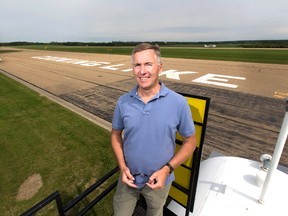 Jim Johannsson, president of the volunteer-run Cooking Lake Airport, stands next to one of the Strathcona County facility's taxiways. 

Greg Southam/Postmedia Network