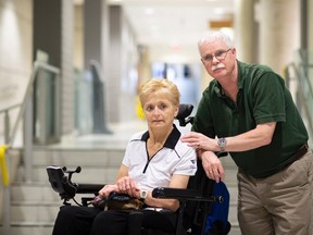 Tim Nolan, who is legally blind, and his wife, Kim, who requires the use of a wheelchair, are photographed together in Hamilton, Wednesday.
THE CANADIAN PRESS/Peter Power