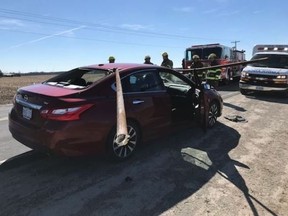 A metal pole dislodged from a truck and impaled a car at the end of March. The driver of the car escaped with minor injuries. Three charges were laid against the driver of the truck. (Contributed photo)