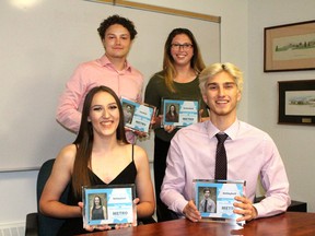 From left starting in front, Fort High students Tia Schram, Chris Coombes, Parker Cullum, Brooklyn Reed, and St. John Paul II’s Kaylee Martyn (not pictured) were honoured for their individual sports during the Metro Edmonton Athletics’ Metro All-Stars awards banquet in Edmonton on May 30.