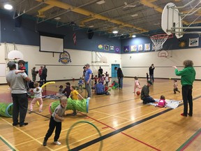 Fathers, uncles and grandfathers play with their family during one of the Dadventure events held in Fort Saskatchewan.