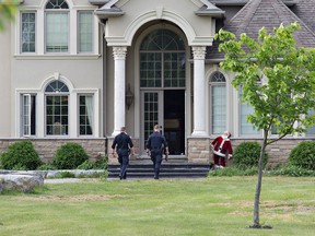 Ontario Provincial Police continue a criminal investigation on Thursday afternoon June 7, 2018 at 218 Jerseyville Road just east of Brantford, Ontario.
(Brian Thompson/Brantford Expositor/Postmedia Network)