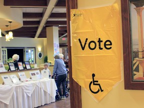 Brigid Goulem/For The Whig-Standard
Residents at the Waterford Kingston Retirement Residence prepares to cast their ballot in the provincial election on Thursday.