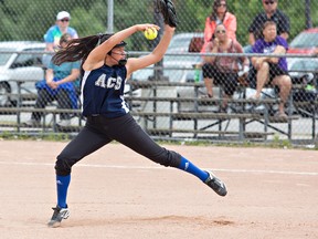 Alexis Smoke of Assumption College winds up to pitch in the Brant County high school girls fastball championship game against Paris District High School on Thursday at Jaycee Park in Brantford. (Brian Thompson/The Expositor)