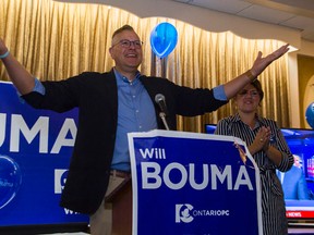 PC candidate Will Bouma and his wife, Joni, address supporters at his victory rally Thursday night after winning Brantford-Brant. (Alex Vialette/The Expositor)