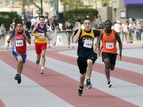 College Avenue Secondary School's Austin Cornish, second from the right, runs in the boys' visually impaired, intellectually disability and ambulatory 100m dash during the TVRA Central track and field finals. Cornish is one of eight Oxford County athletes competing at OFSAA track and field finals. Greg Colgan/Woodstock Sentinel-Review/Postmedia Network file photo