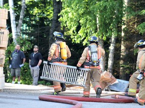 Firefighters respond to a fire at Fibrestick Manufacturing at 45 Industrial Park Court B on Friday morning.