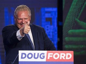 Ontario PC leader Doug Ford reacts after winning the election to become the new premier on Thursday, June 7, 2018. THE CANADIAN PRESS/Nathan Denette