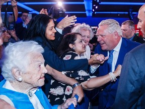 Ontario Progressive Conservative Leader Doug Ford greets supporters after winning a majority government in the Ontario provincial election in Toronto on Thursday. Mark Blinch/The Canadian Press