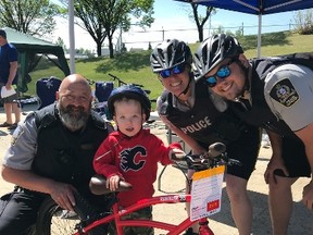 Officers helped educate kids on bike safety at Bike Safe Airdrie 2018 held at the Children's Festival on Sat., May 26.
