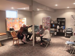 Members of CHAPS celebrate the completion of their new archival room, located in a new basement below a century-old former hospital.