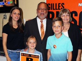 Gilles Bisson posed with family members at his victory party Thursday night. The newly elected MPP for the Timmins riding, said people who claim Timmins is losing out by not having a government representative in the legislature have little understanding of how the system works for government spending.  Bisson was commenting on his election win and how his job will be different with the newer and smaller riding of Timmins.