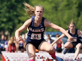 Camille Blain of Chatham-Kent competes in the junior girls' 80-metre hurdles during the SWOSSAA track and field championship at the Chatham-Kent Community Athletic Complex in Chatham, Ont., on Wednesday, May 23, 2018. (MARK MALONE/Chatham Daily News/Postmedia Network)