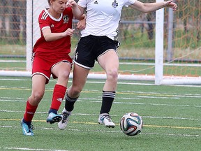 Haylee Lavigne of the Greater Sudbury Impact, battles for the ball with Abby Wroe of Oak Ridges Knights during U21 soccer action in Sudbury, Ont. on Sunday June 3, 2018. Gino Donato/Sudbury Star/Postmedia Network