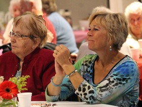 Del Nita and Rita Kelly enjoy the sounds of Beth Portman and the Good Find during the annual City of Spruce Grove Senior’s Strawberry Tea.