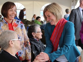 Premier Rachel Notley and Councillor Jane Stroud meet elders at McMurray Metis Festival in Fort McMurray, Alta. on Thursday, May 31, 2018. Laura Beamish/Fort McMurray Today/Postmedia Network