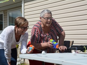 Seniors enjoyed activities during the Seniors’ Week Carnival at Spruce View Lodge on June 6. Activities included a toilet bowl toss, caricatures, a fishing game and ping-pong ball races with water guns (Peter Shokeir | Whitecourt Star).