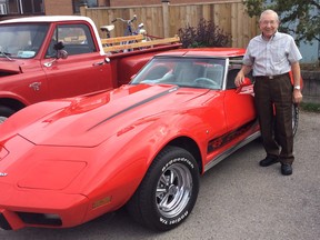 Hamlet Estates resident Percy Davidson shows off the cherry-red Corvette he built, which will be on display at the Spruce Lodge Classic Car Show June 19. (Submitted photo)