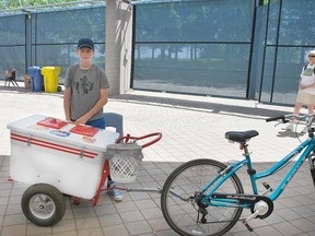 It’s an ongoing community event. All summer Trysten Katahva, a 12-year-old entrepreneur, will sell his wares in neighborhoods and parks in the city. Here, he stops with his offerings for patrons of Sunday’s Musicfest at Roberta Bondar Pavilion.
ALLANA PLAUNT/SPECIAL TO SAULT THIS WEEK