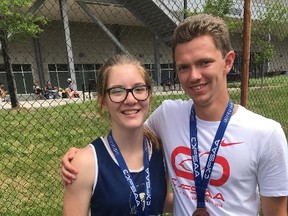 Delhi Raiders Ashley Spain and Kyle Lewis are all smiles after finishing with medals at the 2018 OFSAA Track and Field Championships in Toronto last week. Spain earned silver in junior girls javelin while Lewis captured bronze in senior boys pole vault.
Contributed Photo
