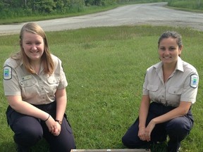 Long Point Provincial Park staff Starr Mudge (left) and Brianne McCutcheon display one of the turtle nest protection cages available on loan from the park. Submitted Photo