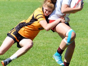 Trenton vs. Bayside in the 2018 Barbarian Cup junior girls rugby semi-final round Monday at MAS Park. (Catharine Frost for The Intelligencer)