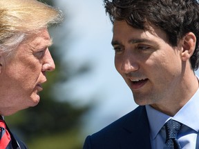 Leon Neal/Getty Images
U.S. President Donald Trump, left, and Prime Minister Justin Trudeau stand together during the welcome ceremony on the first day of the G7 Summit, on June 8, in La Malbaie. Canada hosted the leaders of the U.K., Italy, the U.S., France, Germany and Japan for the two day summit, in the town of La Malbaie.