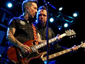 Guitarist Kevin Roentgen and bassist Kelly LeMieux of Buckcherry perform during the East Coast Garden Party at Snye Point Park in Fort McMurray, Alta. on Friday, August 25, 2017. Vincent McDermott/Fort McMurray Today/Postmedia Network