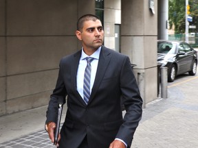 Peter Khill, charged with second-degree murder in the death of Jon Styres of Six Nations, leaves court in Hamilton on Tuesday. (Colin Perkel/The Canadian Press)