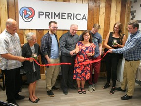 Fairview's Primerica office, started by Kris and Liann Hvamb, had its grand opening and ribbon cutting June 7. From left: Ken and Bernice O'Dell of the Grande Prairie Primerica office, Connor Hvamb, Kris and Liann Hvamb cutting the ribbon, Jayden Hvamb, Krystle and Damon O'Dell of the GP Primerica office.